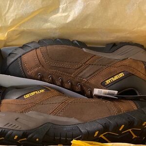 Caterpillar steel toe boots brand new never even been tried on due to my leg